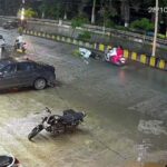 VIDEO : कार से टक्कर के बाद विपरित लेन में गिरा युवक, चपेट में आई स्कूटी सवार दो महिलाएं
